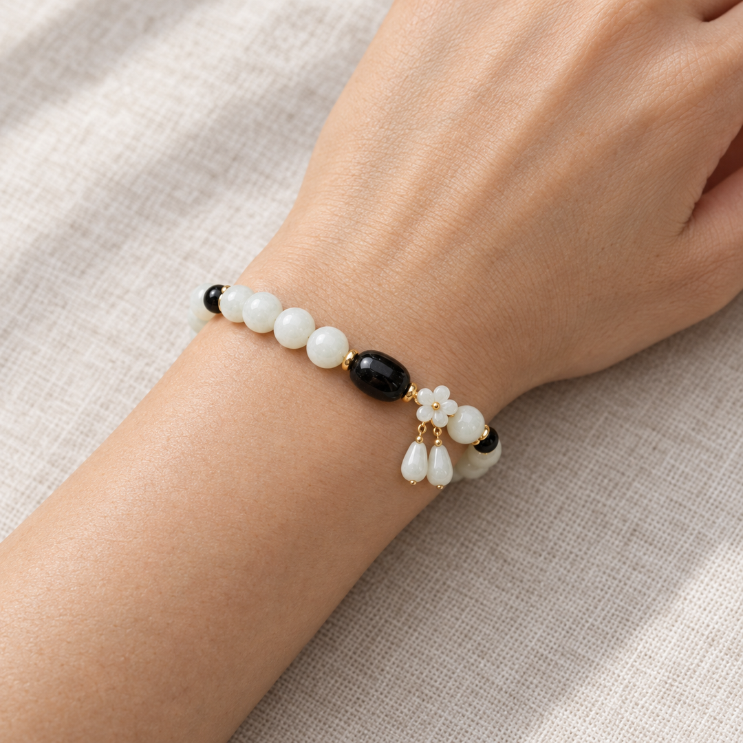 White Jade Guardian Bracelet worn on the wrist